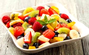 Quantas calorias em 1 Porçoes Salada De Frutas Completa?