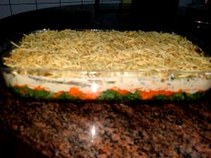 Quantas calorias em 1 Porçoes Salada Em Camadas?