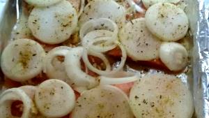 Quantas calorias em 1 Porçoes Salmao Assado Ao Alho E Oleo?