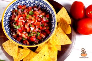 Quantas calorias em 1 Porçoes Salsa De Tomate E Cebola?