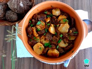 Quantas calorias em 1 Porçoes Soma De Inhame Com Carne?