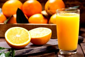 Quantas calorias em 1 Porçoes Suco De Laranja Machadão?