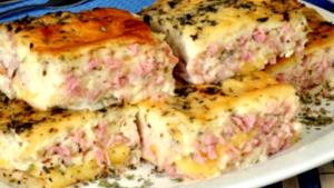 Quantas calorias em 1 Porçoes Torta De Queijo E Presunto?