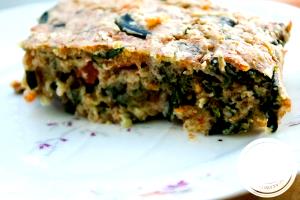 Quantas calorias em 1 Porçoes Torta İntegral De Espinafre Com Queijo Minas?
