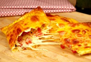 Quantas calorias em 1 Unidade Pastel de Pizza?