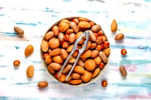 Quantas calorias em 1 Xícara Nozes Misturadas?