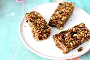 Quantas calorias em 100 G Barras de Granola com Pepitas de Chocolate Macias?