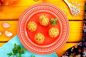 Quantas calorias em 100 g Bolinho de Arroz Integral da Bela Gil?