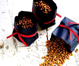 Quantas calorias em 100 G Grão Aromatizado Com Sésamo?