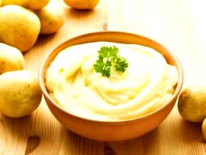 Quantas calorias em 100 G Purê de Batatas (com Leite Integral e Manteiga)?