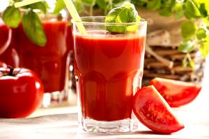 Quantas calorias em 100 G Suco de Tomate?