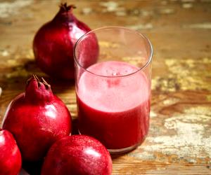Quantas calorias em 100 G Sumo De Romã E Framboesa (Fresco)?